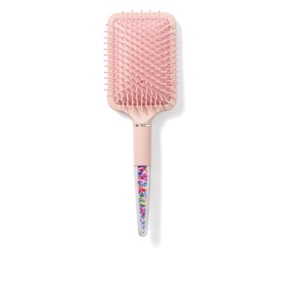 In Search Of this sprinkle paddle brush